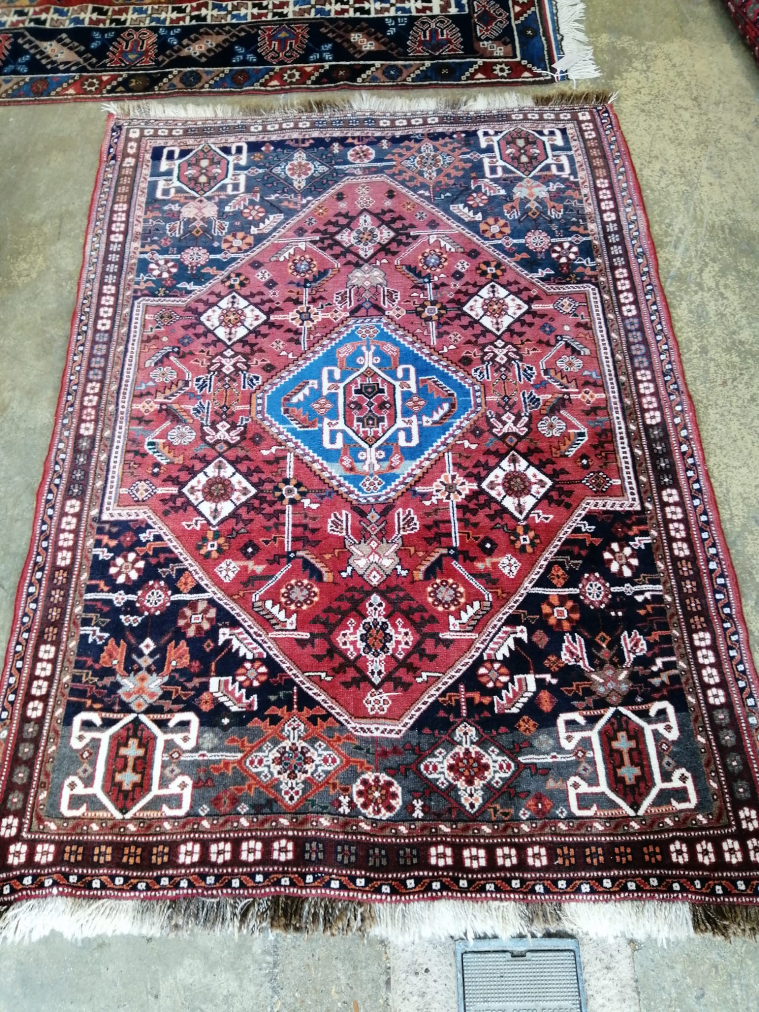 A North West Persian red ground rug, 160 x 110cm